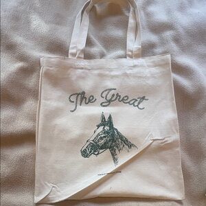 THE GREAT. Cream Tote Bag with Green Horse Design